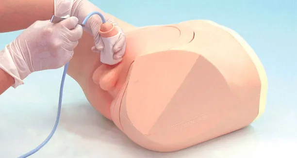 Simulátor pre nácvik mužskej katetrizácie a prevedenie klystíru